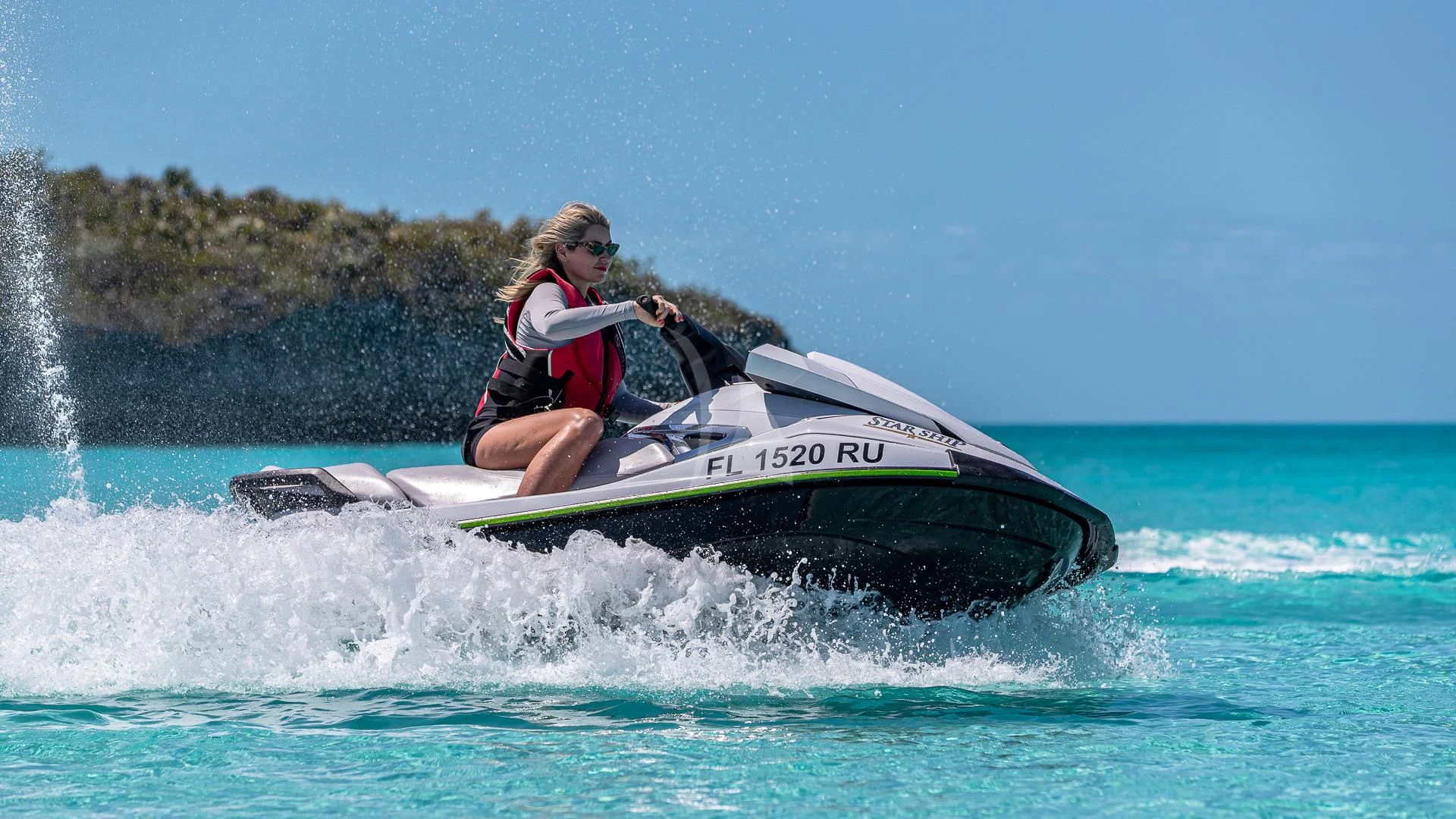 a man in a jet ski aboard STARSHIP Yacht for Charter