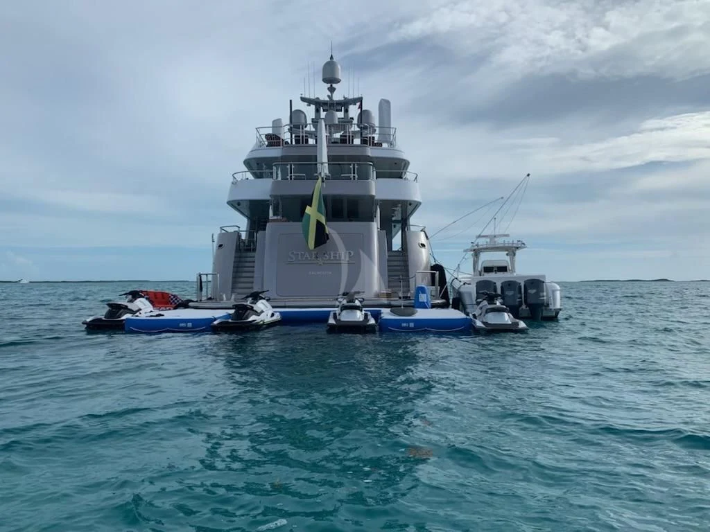a large ship in the water aboard STARSHIP Yacht for Charter
