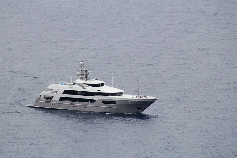 a white yacht in the water aboard STARSHIP Yacht for Charter