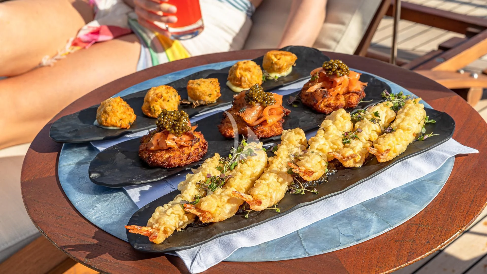 a plate of food aboard STARSHIP Yacht for Charter
