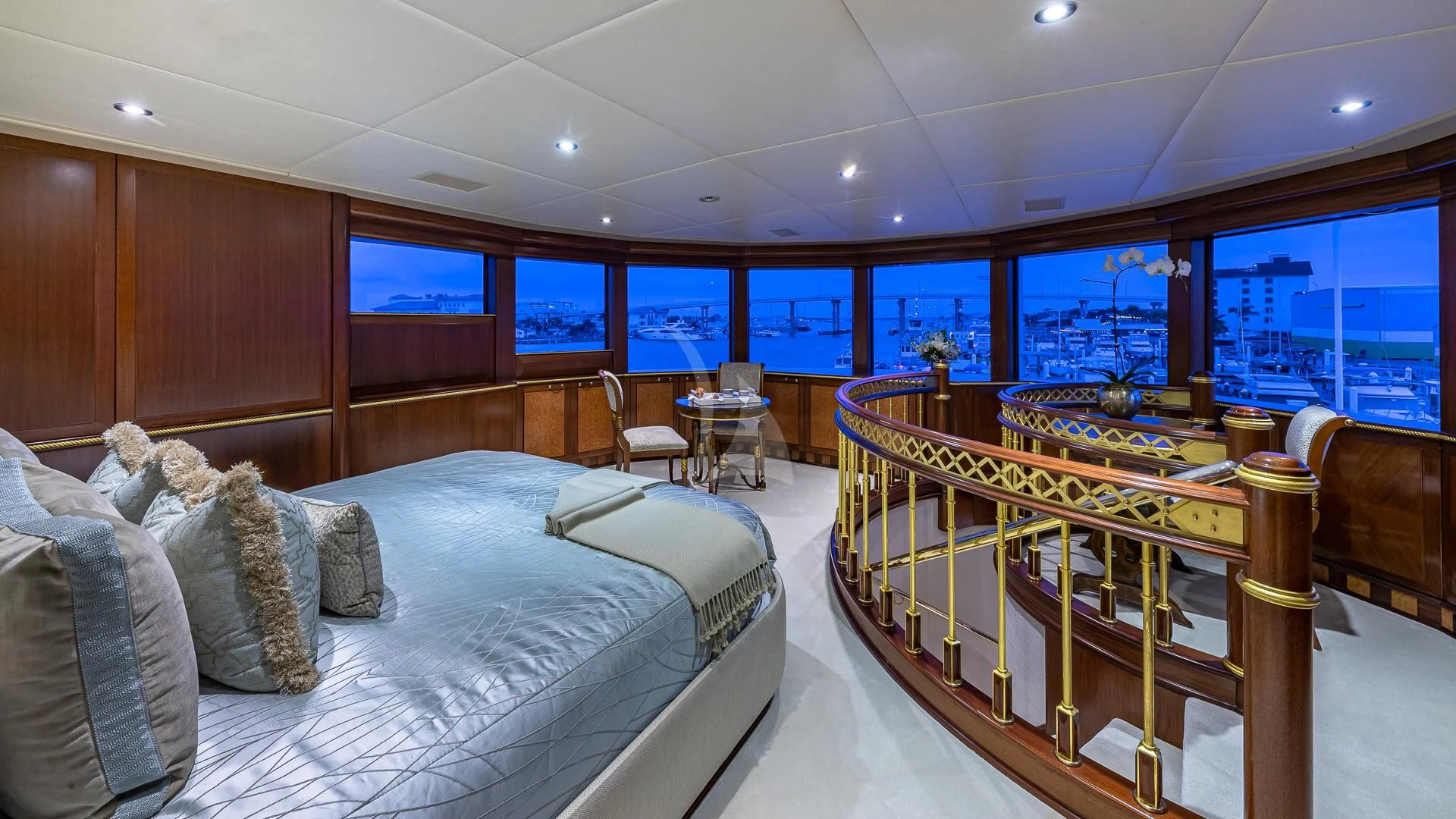 a large bed in a room aboard STARSHIP Yacht for Charter