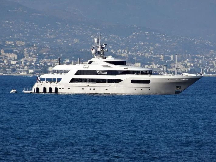 a white yacht in the water aboard STARSHIP Yacht for Charter