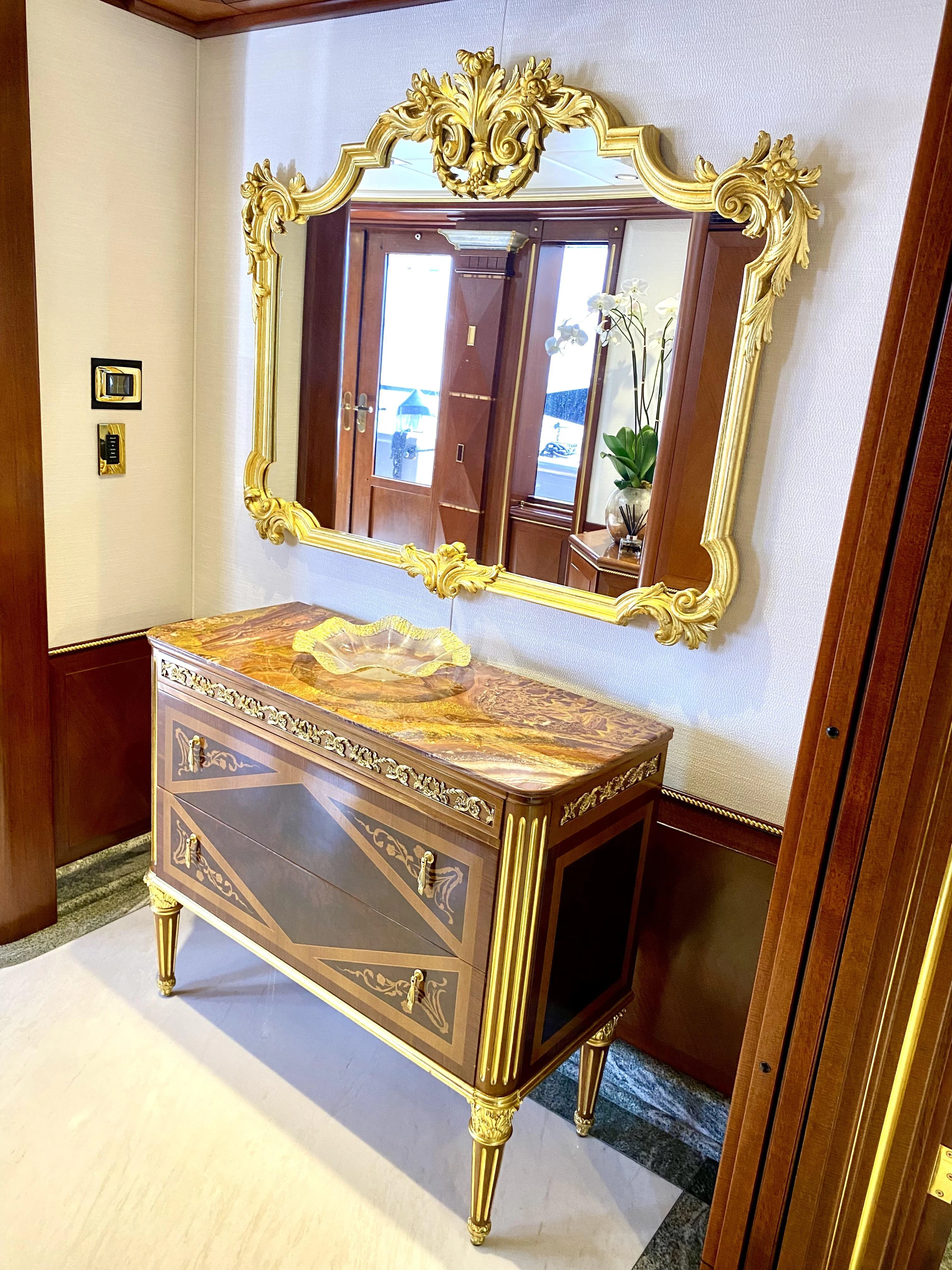 a large antique piano aboard STARSHIP Yacht for Charter