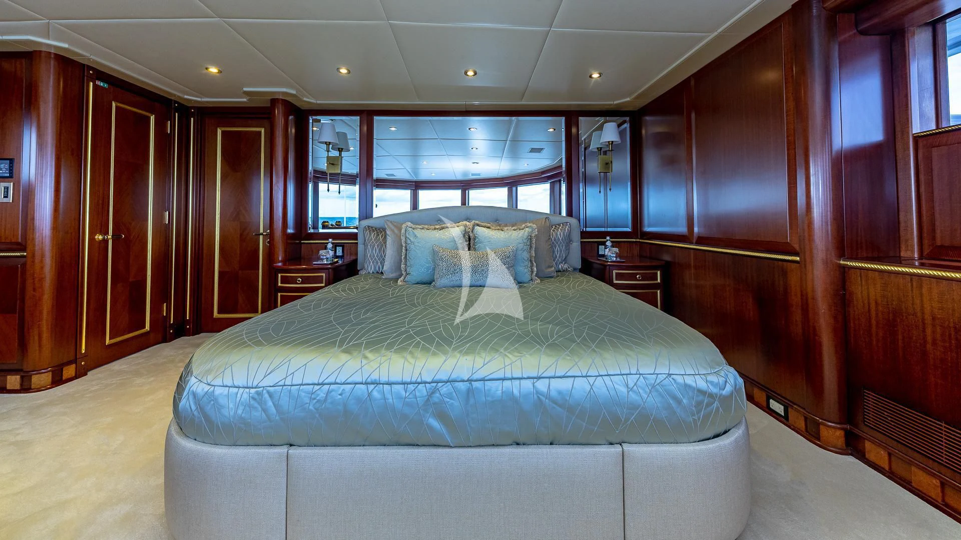 a bed in a room aboard STARSHIP Yacht for Charter