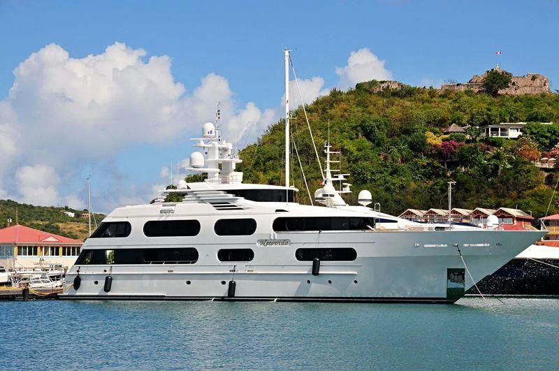a white yacht in the water aboard STARSHIP Yacht for Charter