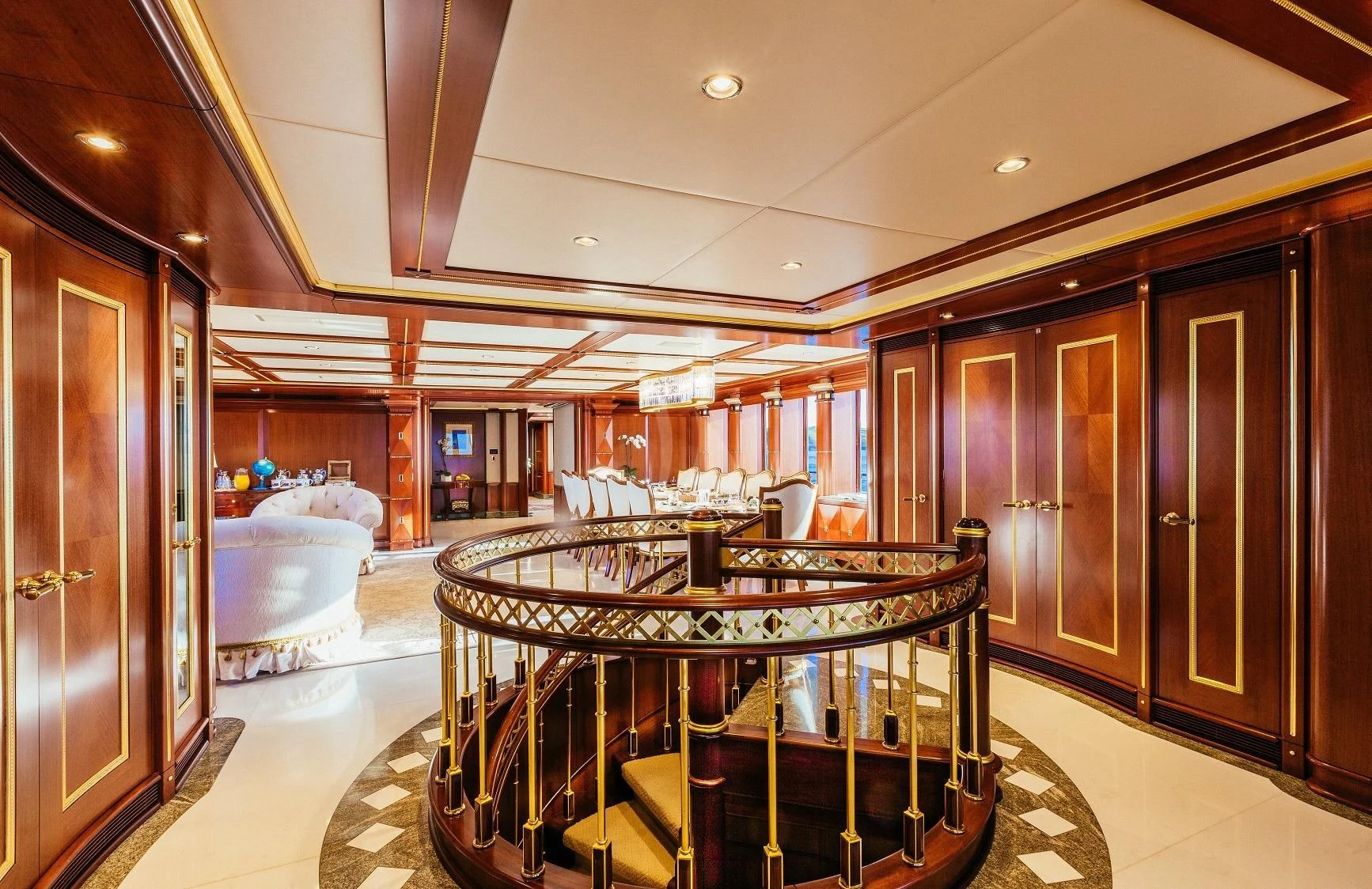 a large room with a bed and a closet aboard STARSHIP Yacht for Charter