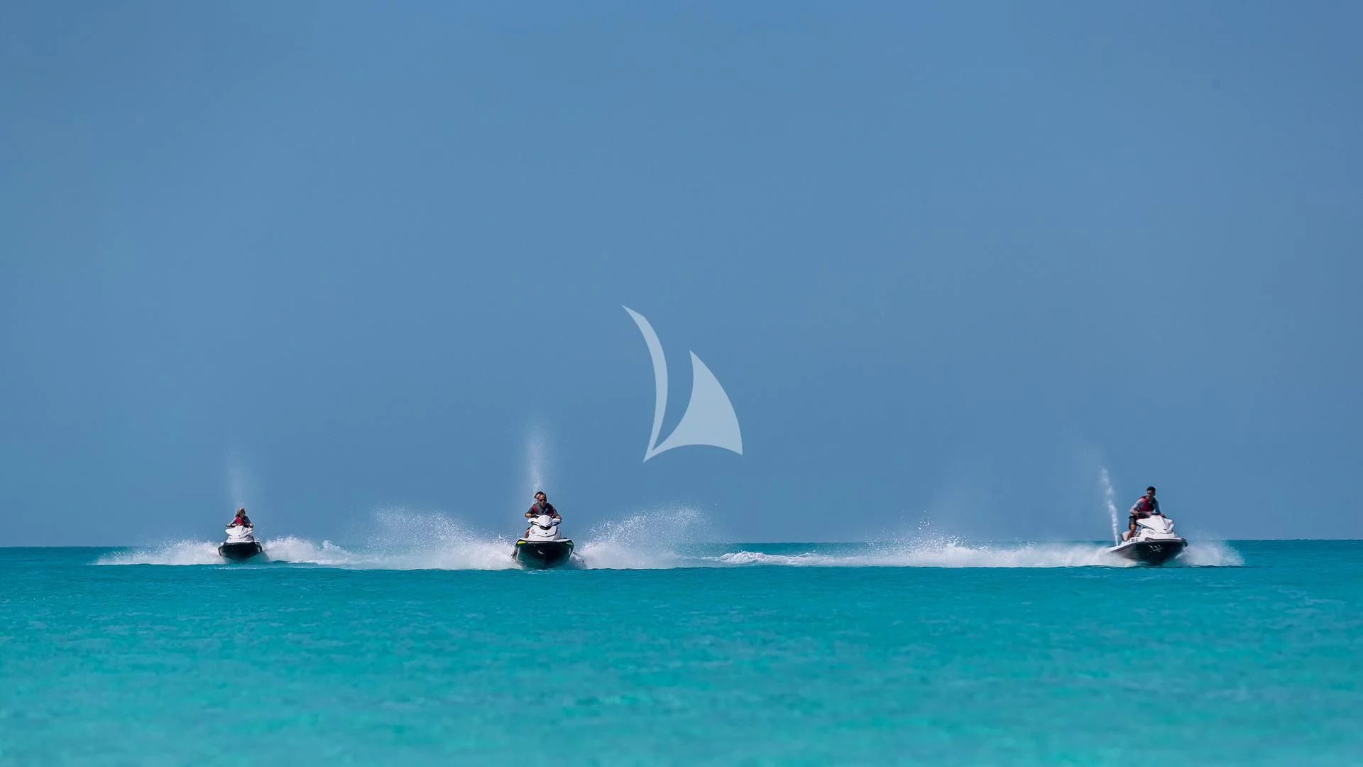 a group of boats in the water aboard STARSHIP Yacht for Charter