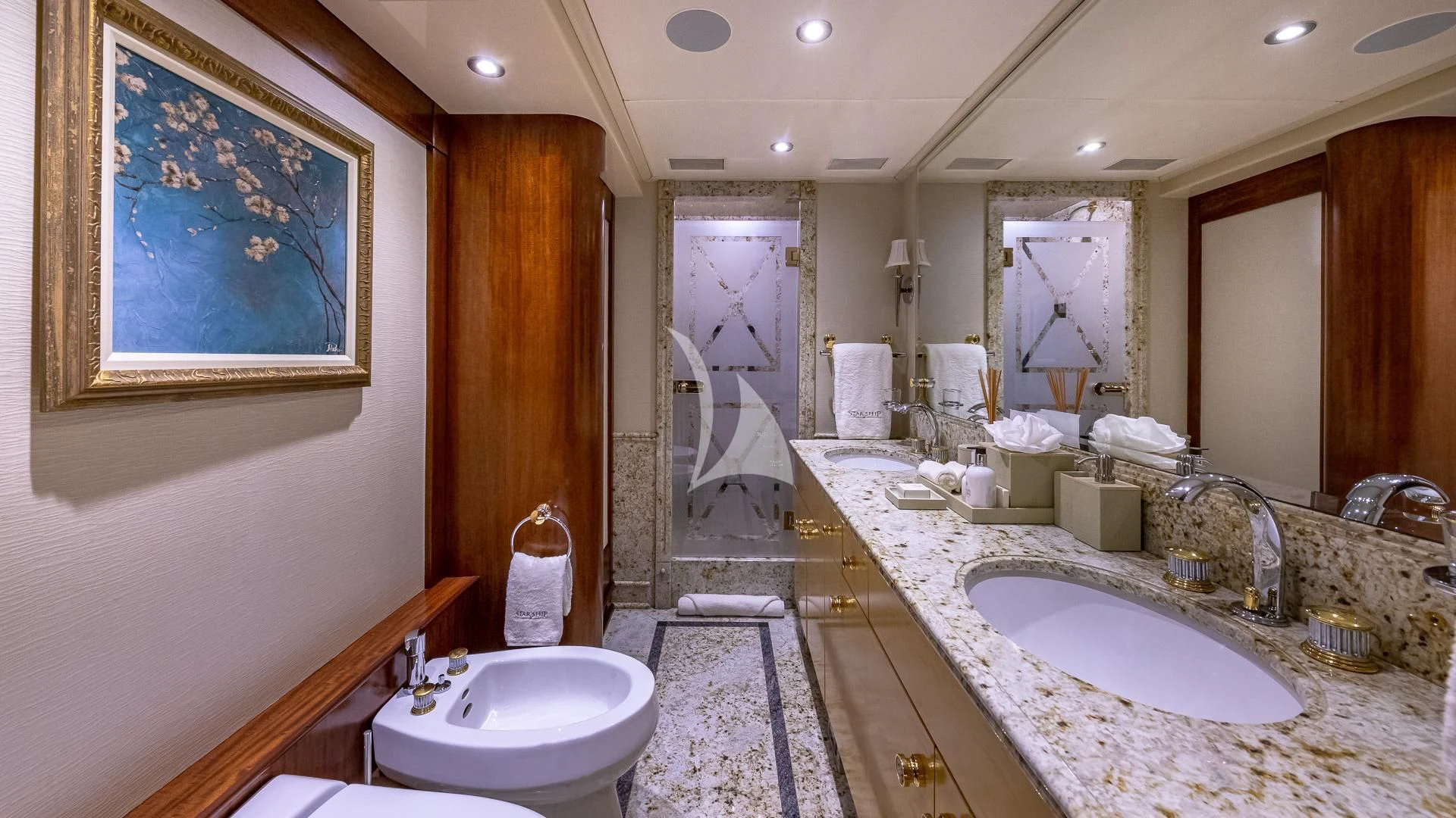 a bathroom with a large marble countertop aboard STARSHIP Yacht for Charter