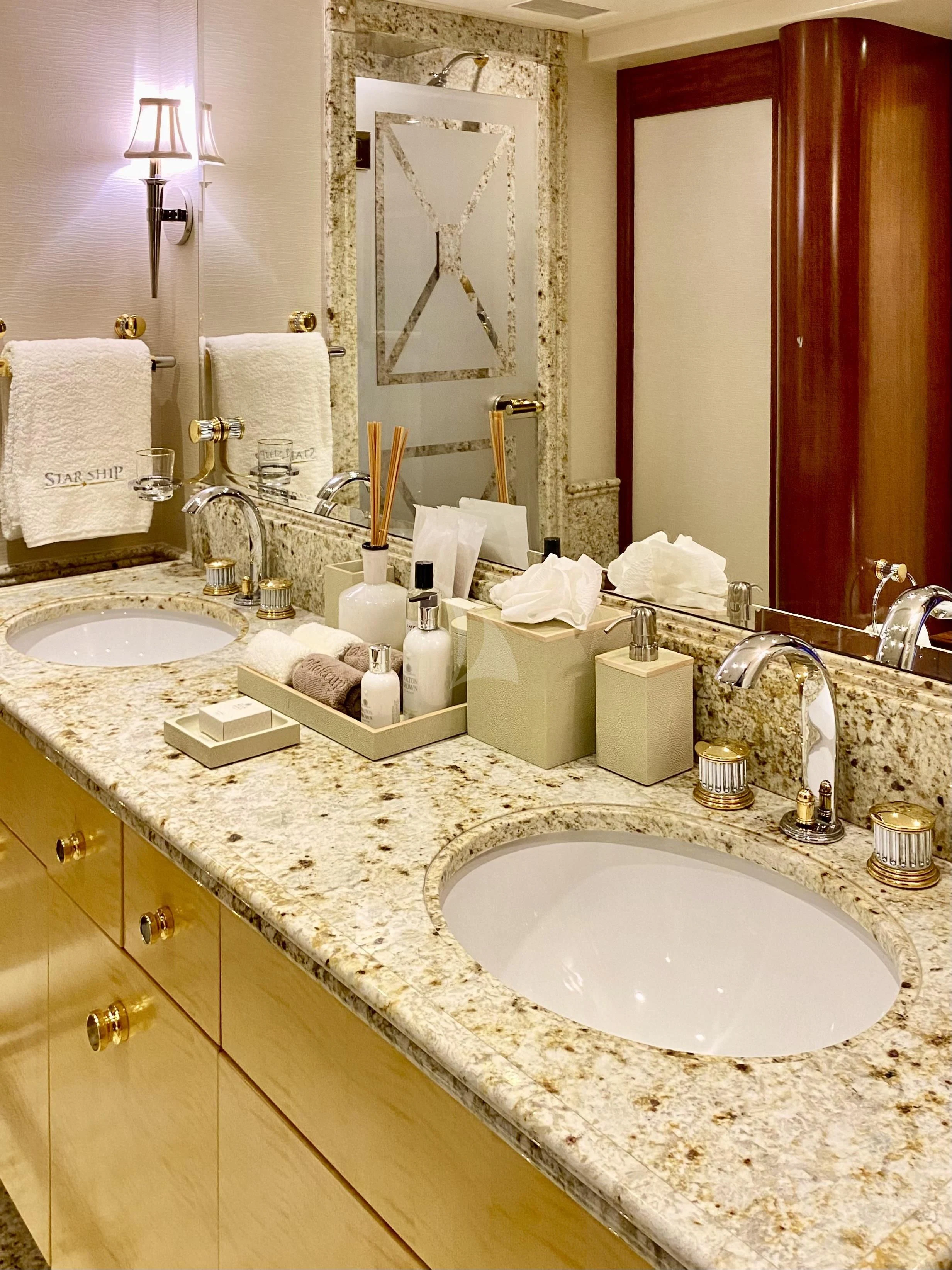 a bathroom with two sinks aboard STARSHIP Yacht for Charter
