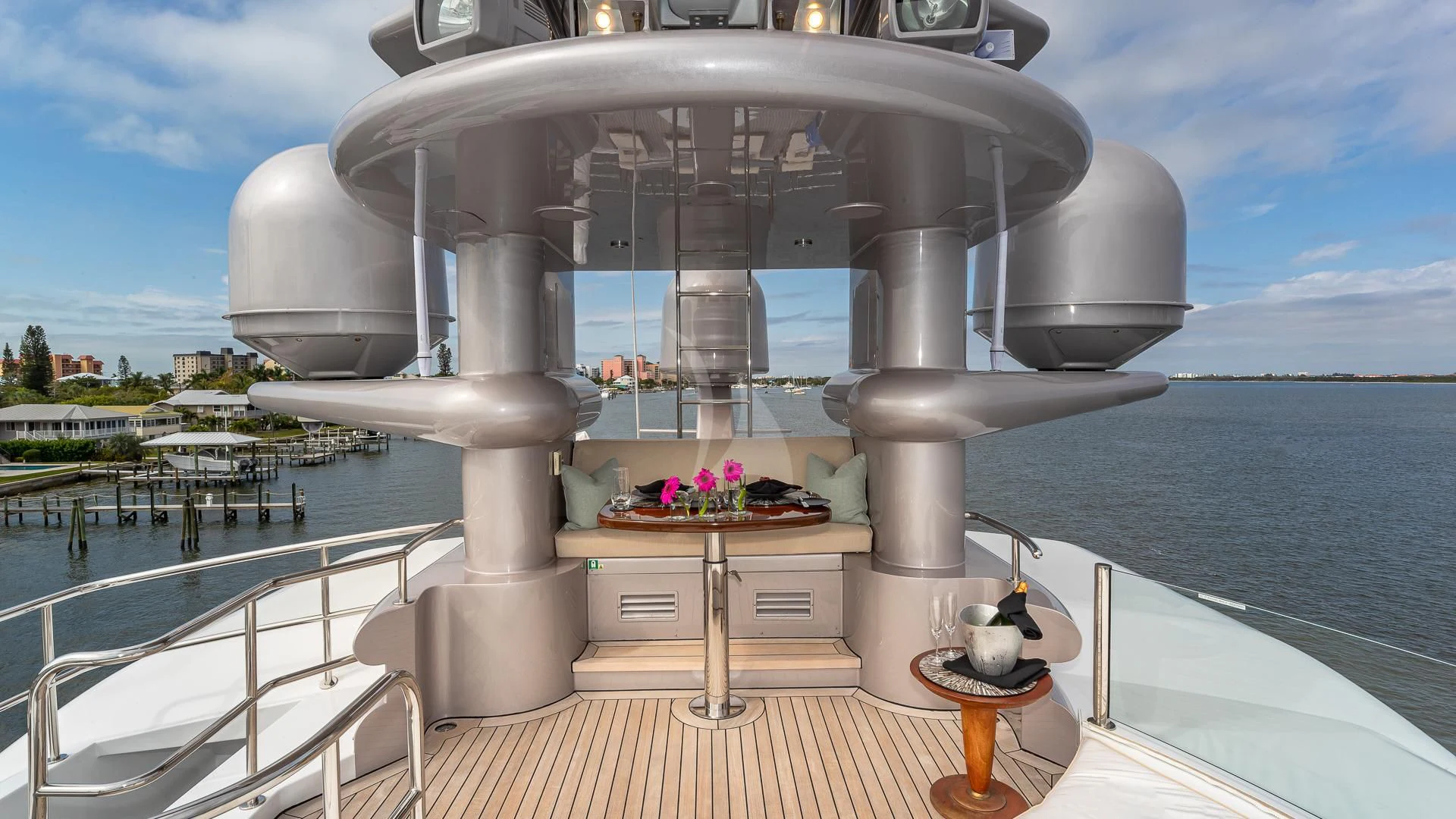 a large white sculpture on a deck overlooking a body of water aboard STARSHIP Yacht for Charter