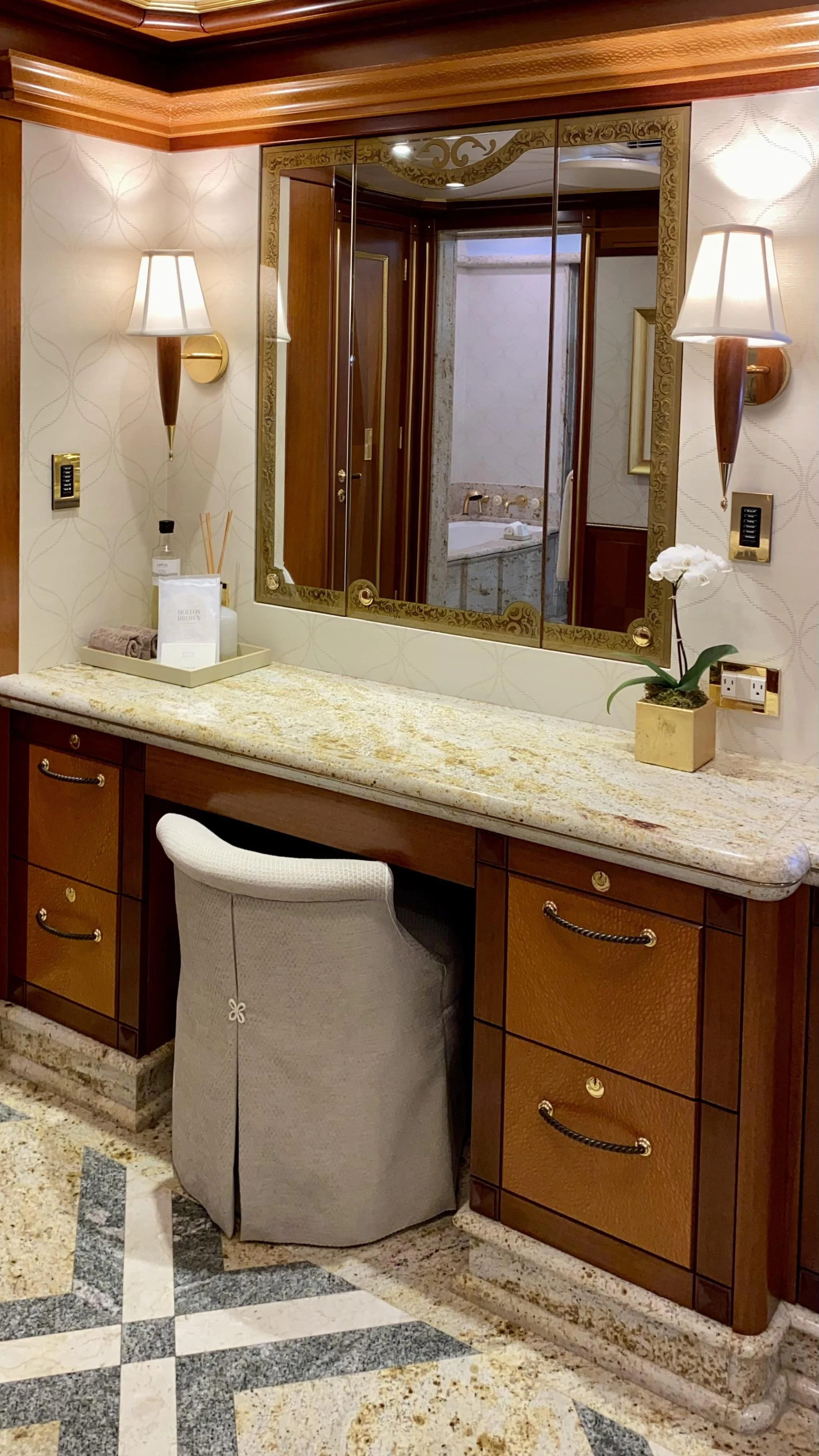 a bathroom with a large mirror aboard STARSHIP Yacht for Charter