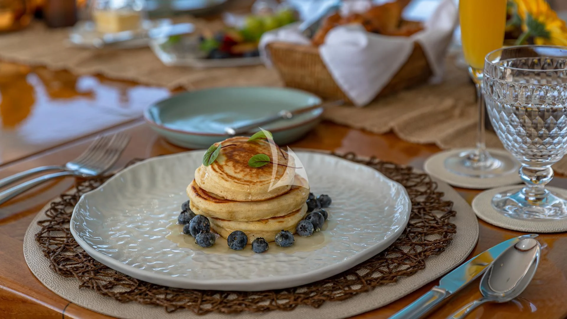a dessert on a plate aboard STARSHIP Yacht for Charter