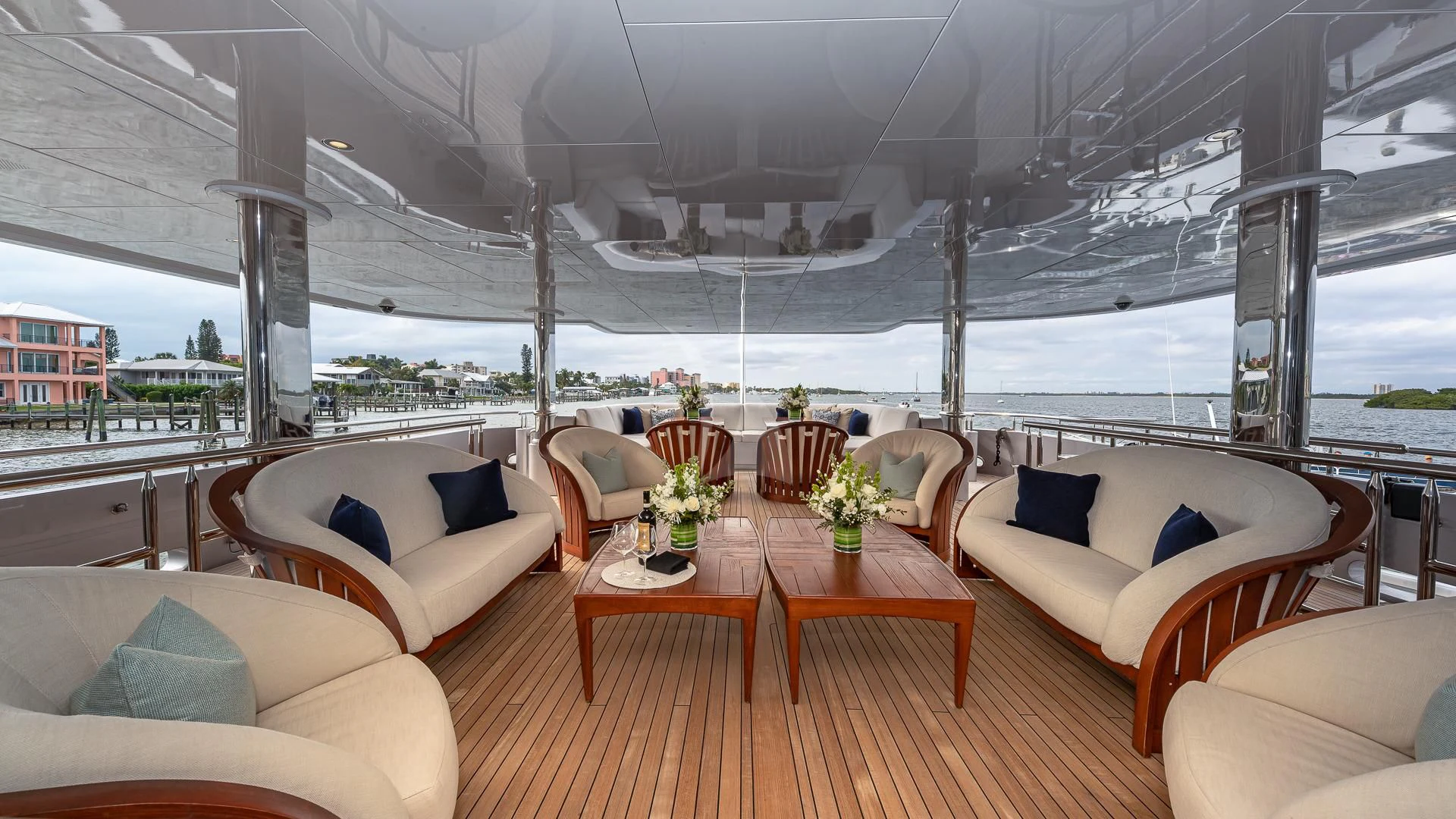 a room with a table and chairs aboard STARSHIP Yacht for Charter