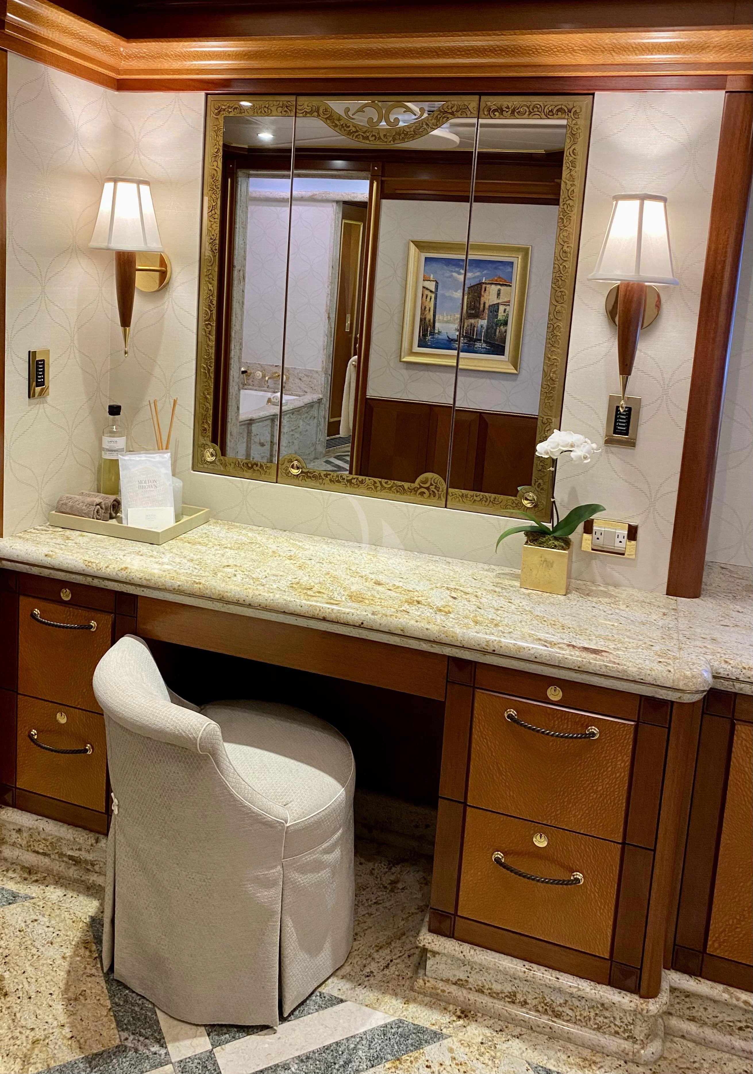 a bathroom with a large mirror aboard STARSHIP Yacht for Charter