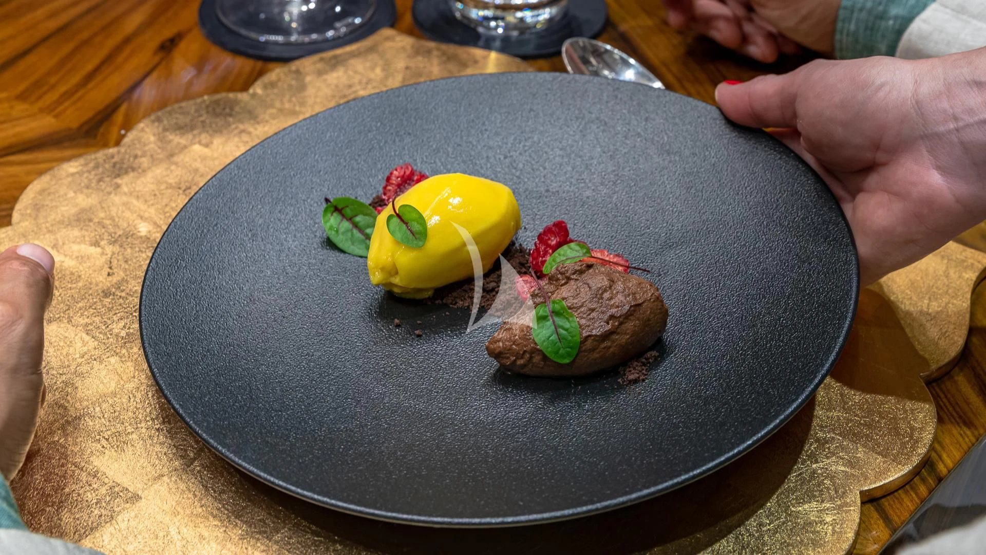 a plate of food aboard STARSHIP Yacht for Charter