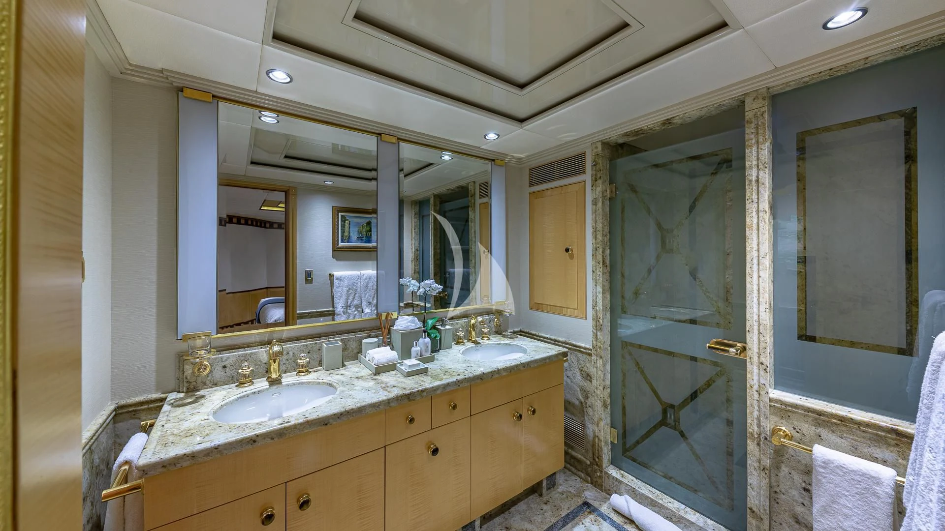 a bathroom with a large mirror aboard STARSHIP Yacht for Charter