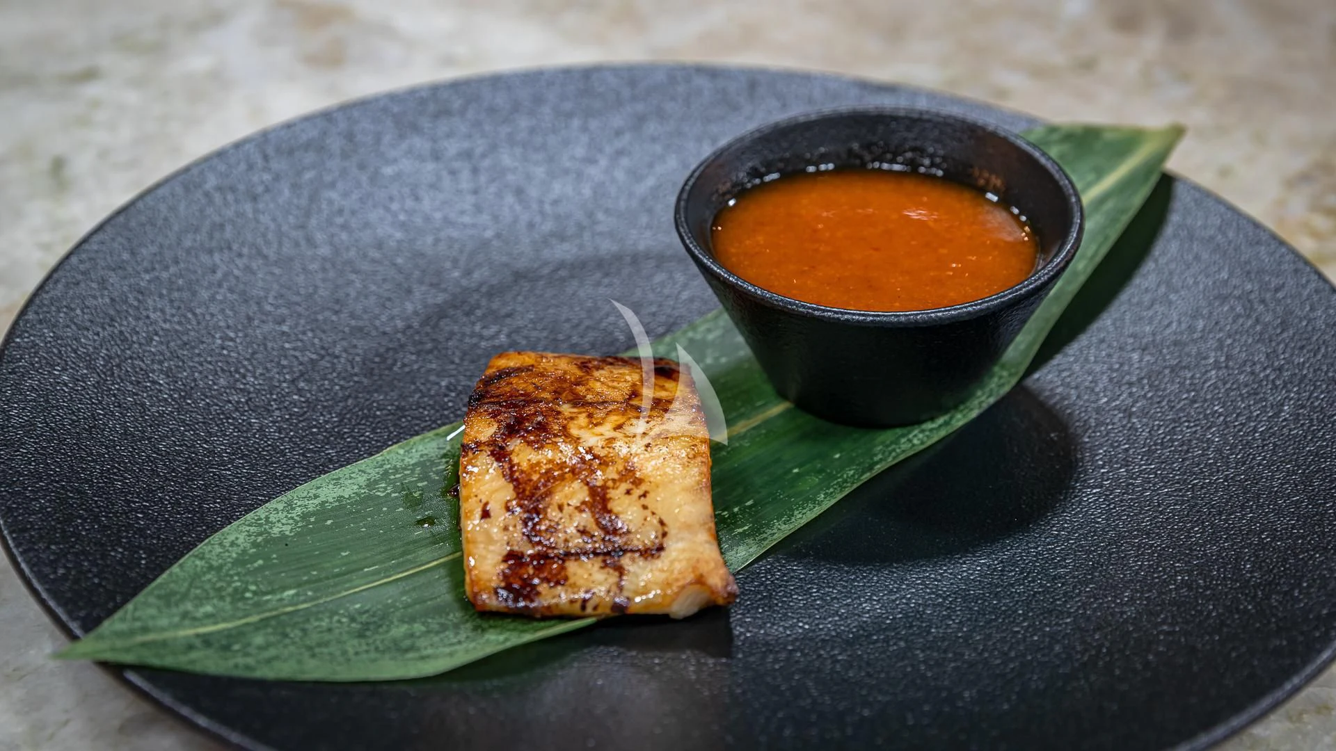 a plate of food aboard STARSHIP Yacht for Charter