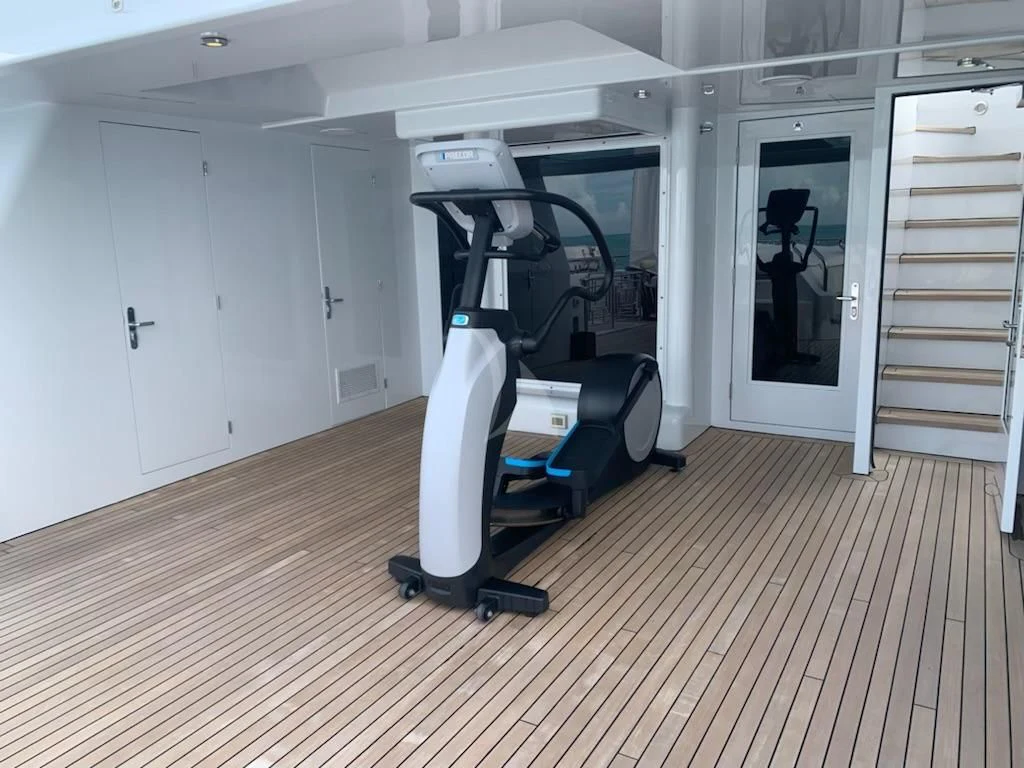 a machine in a room aboard STARSHIP Yacht for Charter