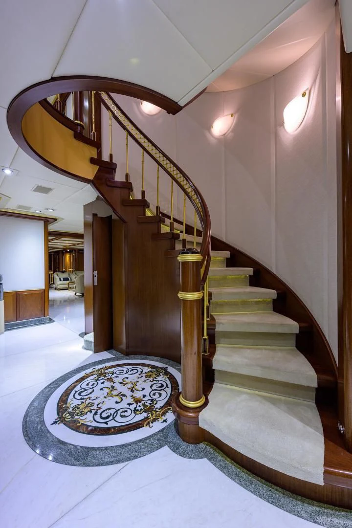 a staircase in a building aboard STARSHIP Yacht for Charter