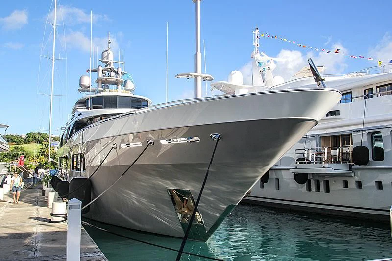 a couple of large boats docked aboard STARSHIP Yacht for Charter