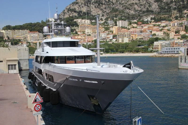a large boat in the water aboard STARSHIP Yacht for Charter