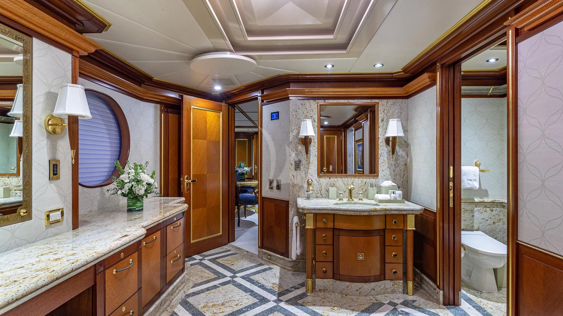 a bathroom with a sink and a toilet aboard STARSHIP Yacht for Charter