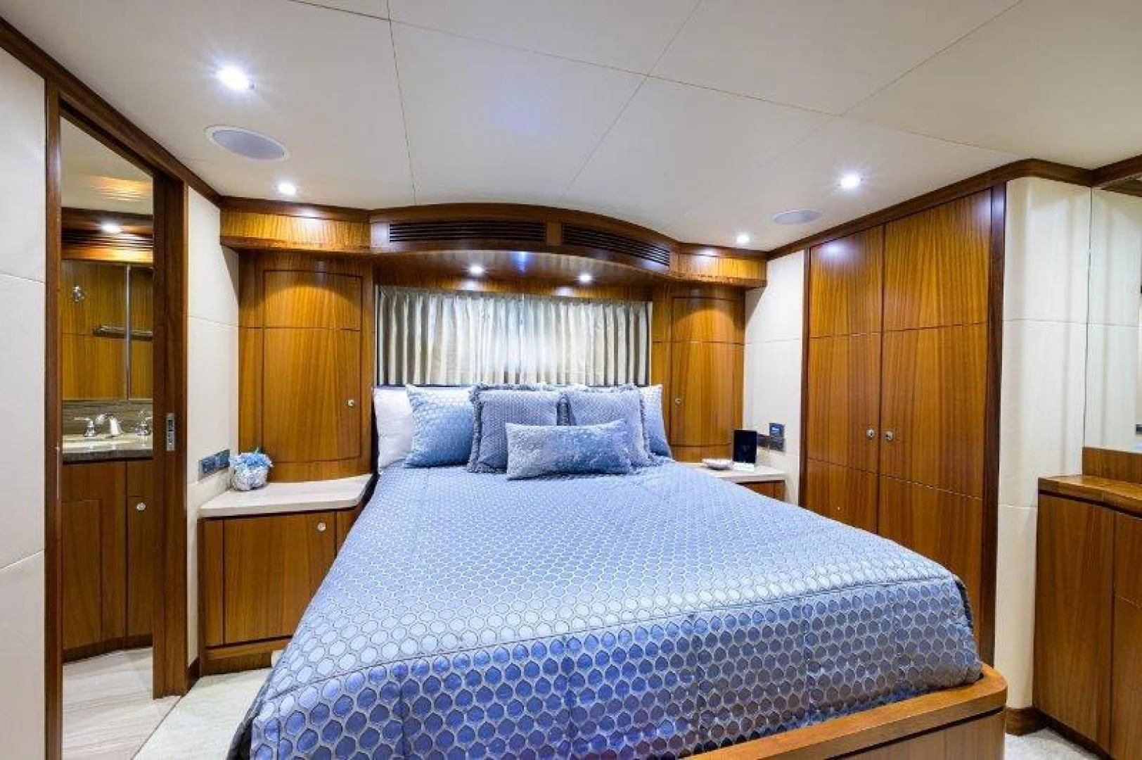 a bed in a room aboard SOUNDINGS Yacht for Sale