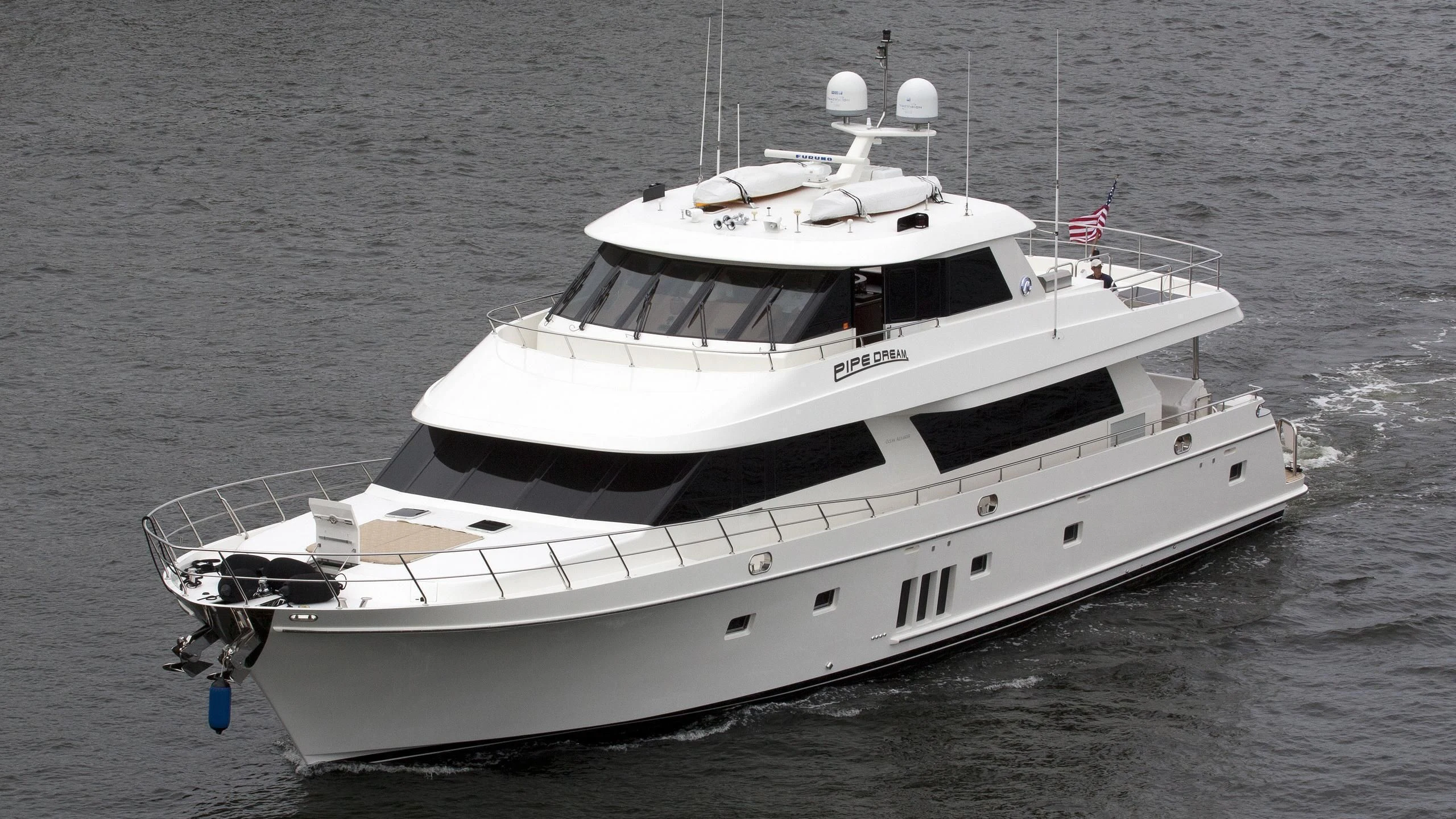 a white boat in the water aboard SOUNDINGS Yacht for Sale