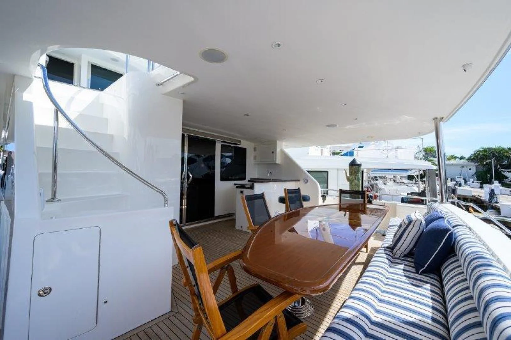 a room with a table and chairs aboard SOUNDINGS Yacht for Sale