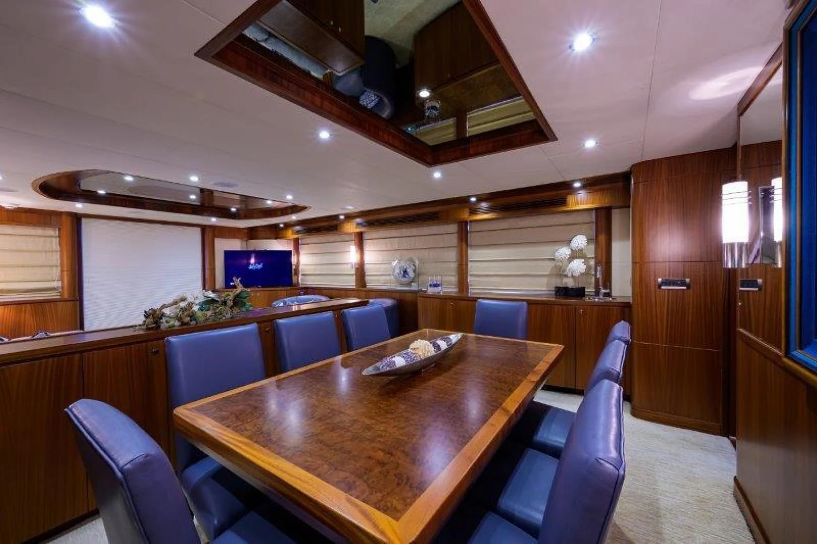 a dining table in a room aboard SOUNDINGS Yacht for Sale