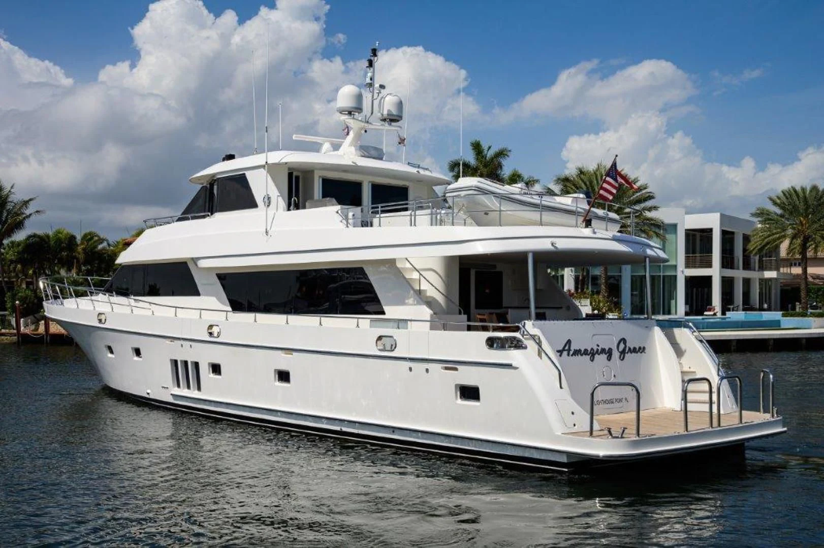 a white boat on the water aboard SOUNDINGS Yacht for Sale