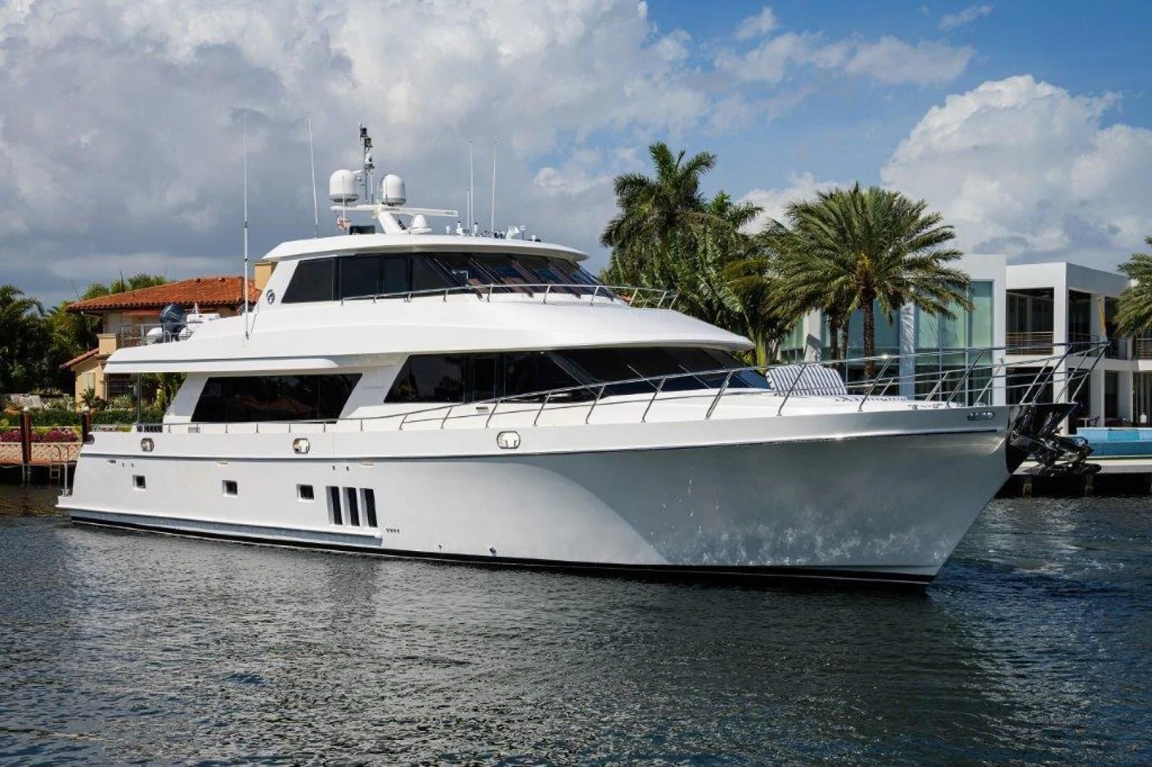 a white yacht in the water aboard SOUNDINGS Yacht for Sale