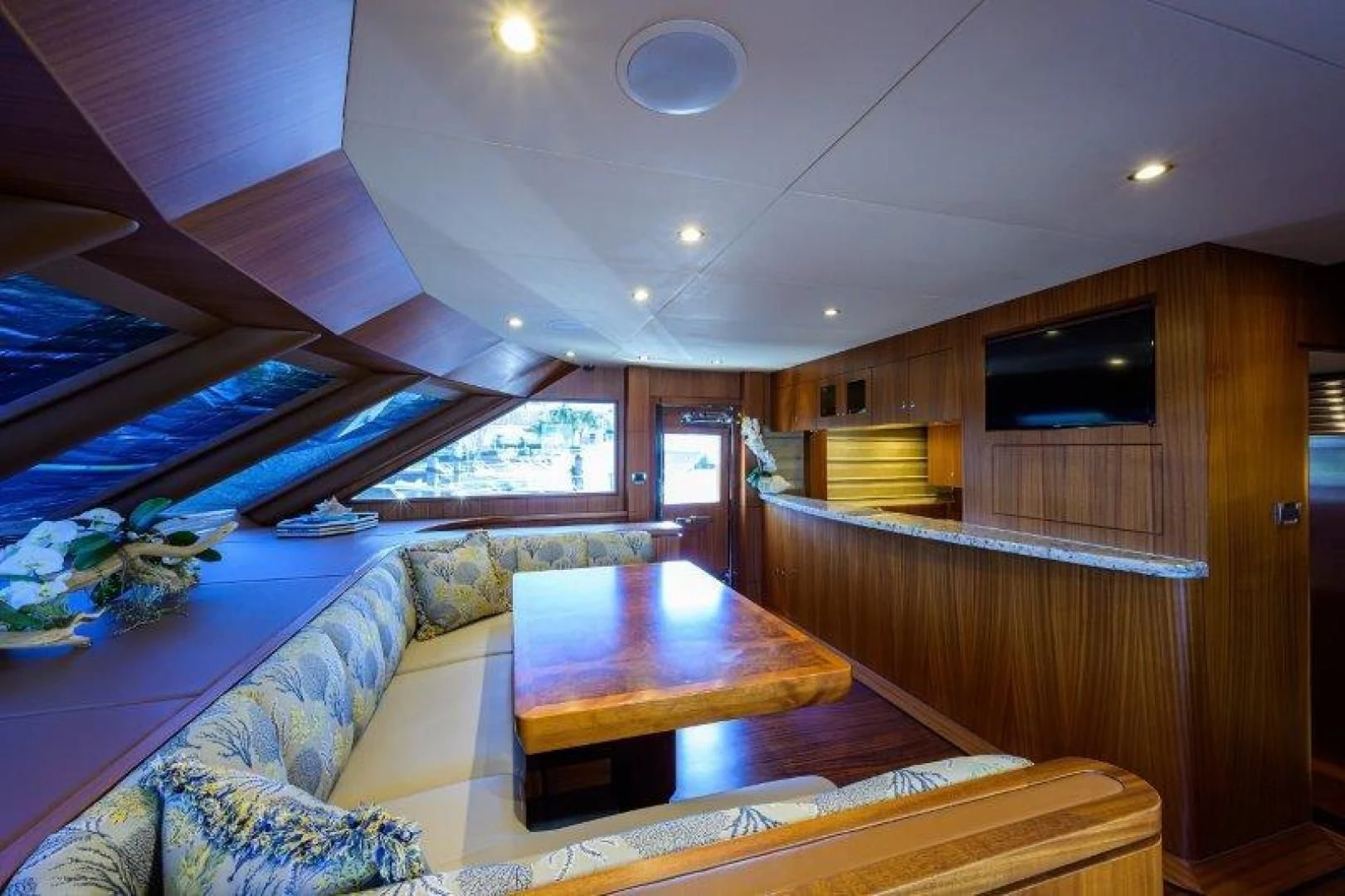 a room with a couch and a table aboard SOUNDINGS Yacht for Sale