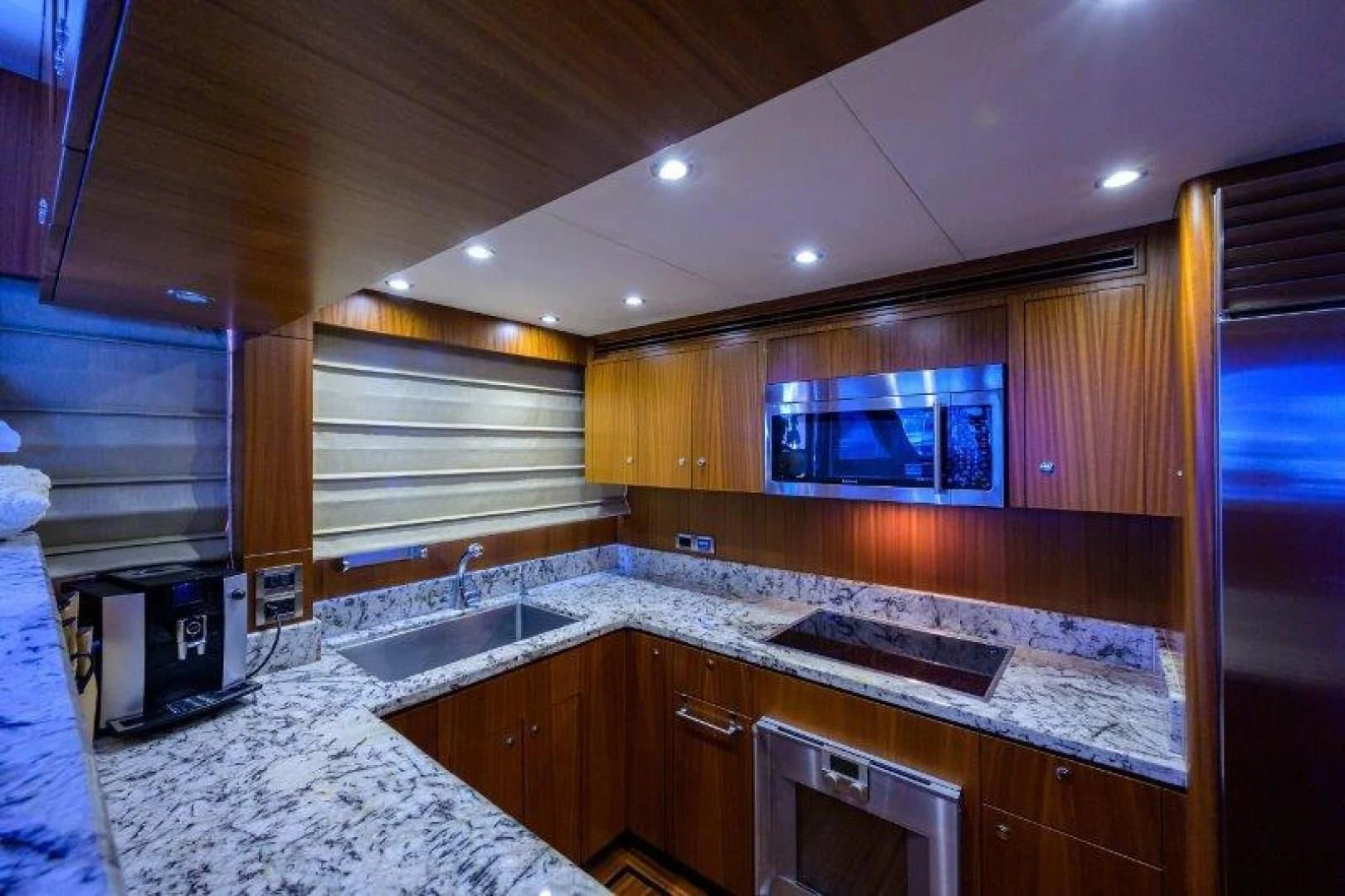 a kitchen with a large countertop aboard SOUNDINGS Yacht for Sale