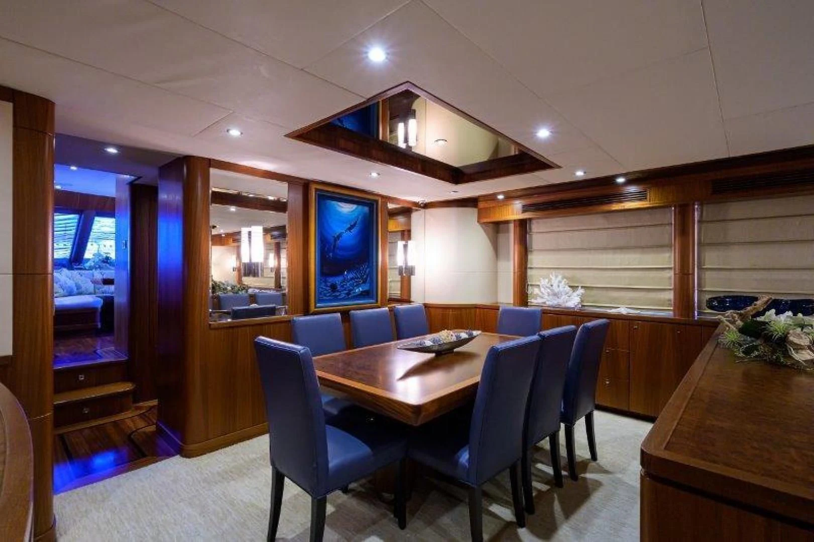 a room with a table and chairs aboard SOUNDINGS Yacht for Sale
