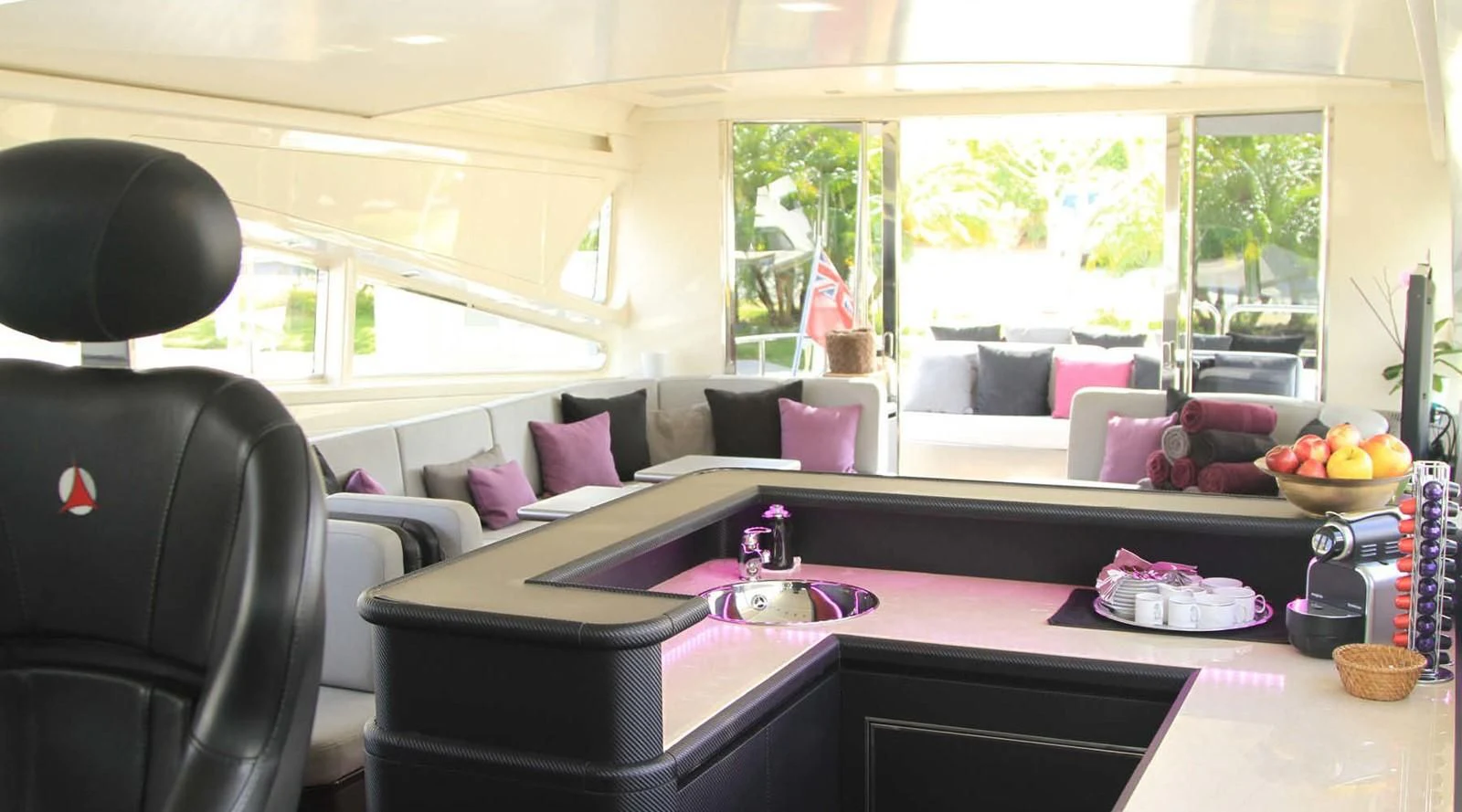 a living room with a large window aboard MYSVEN Yacht for Sale