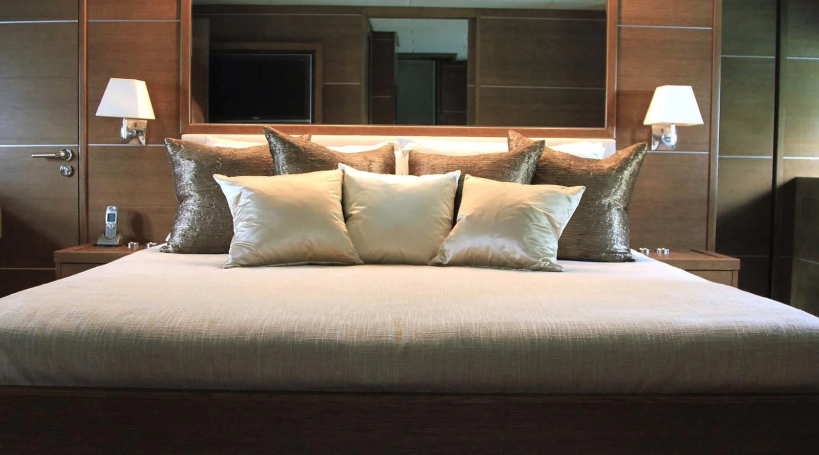 a bed with pillows aboard MYSVEN Yacht for Sale