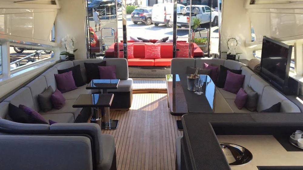 a living room with a couch and a tv aboard MYSVEN Yacht for Sale