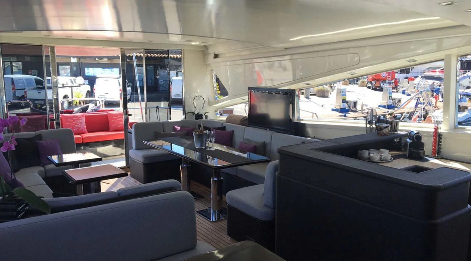 a room with a table and chairs aboard MYSVEN Yacht for Sale
