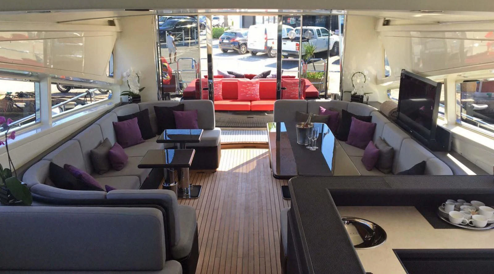 a living room with a large window aboard MYSVEN Yacht for Sale