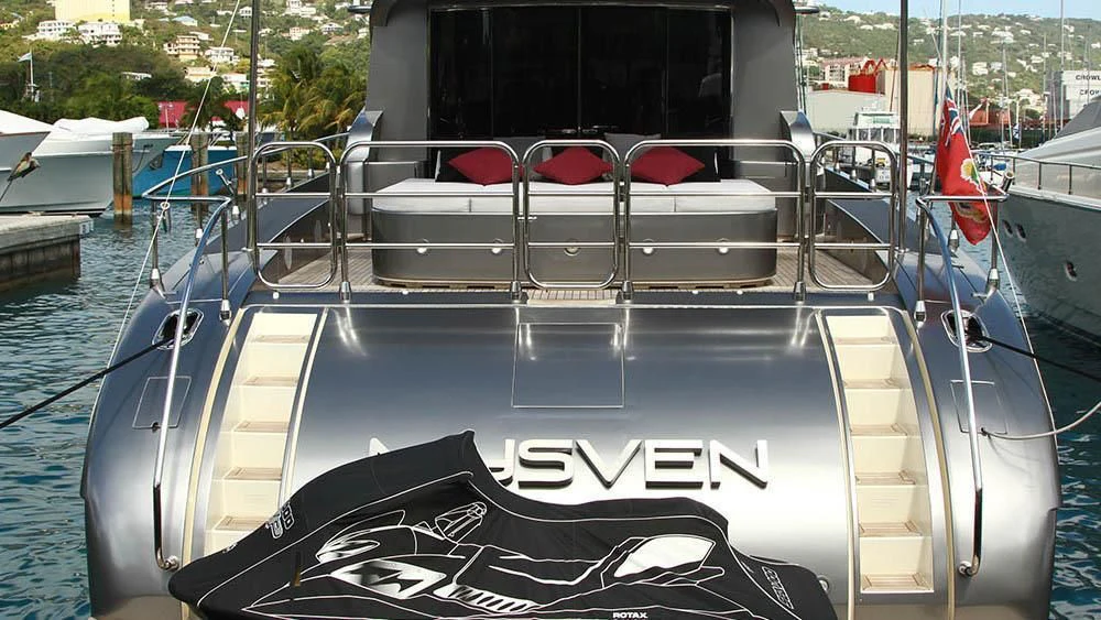 a boat with a deck and chairs aboard MYSVEN Yacht for Sale