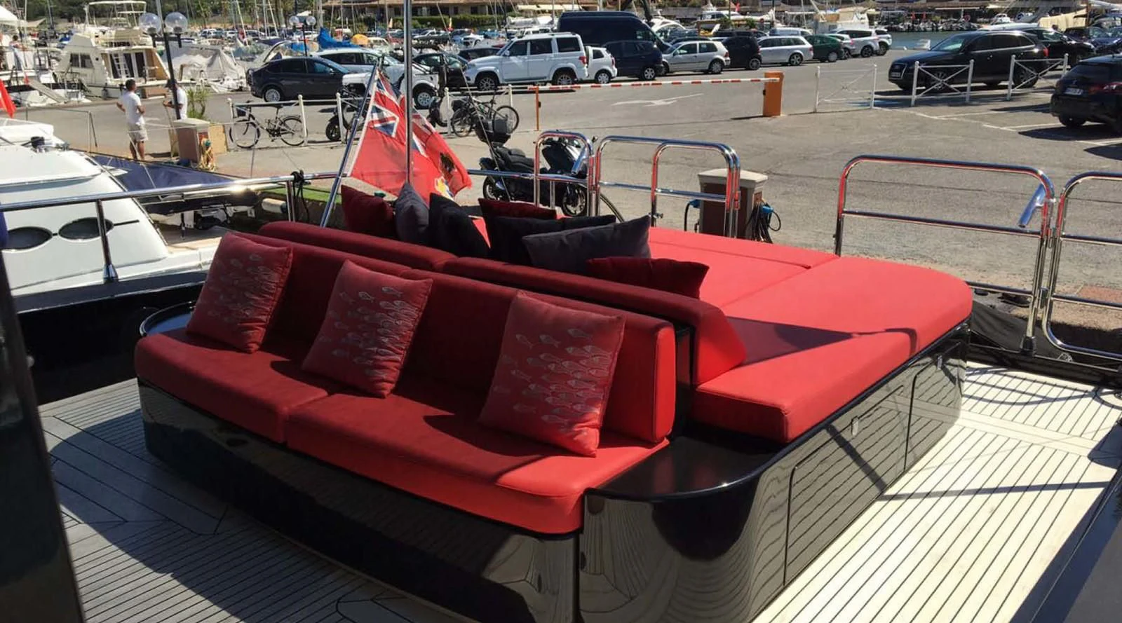 a red couch on a boat aboard MYSVEN Yacht for Sale