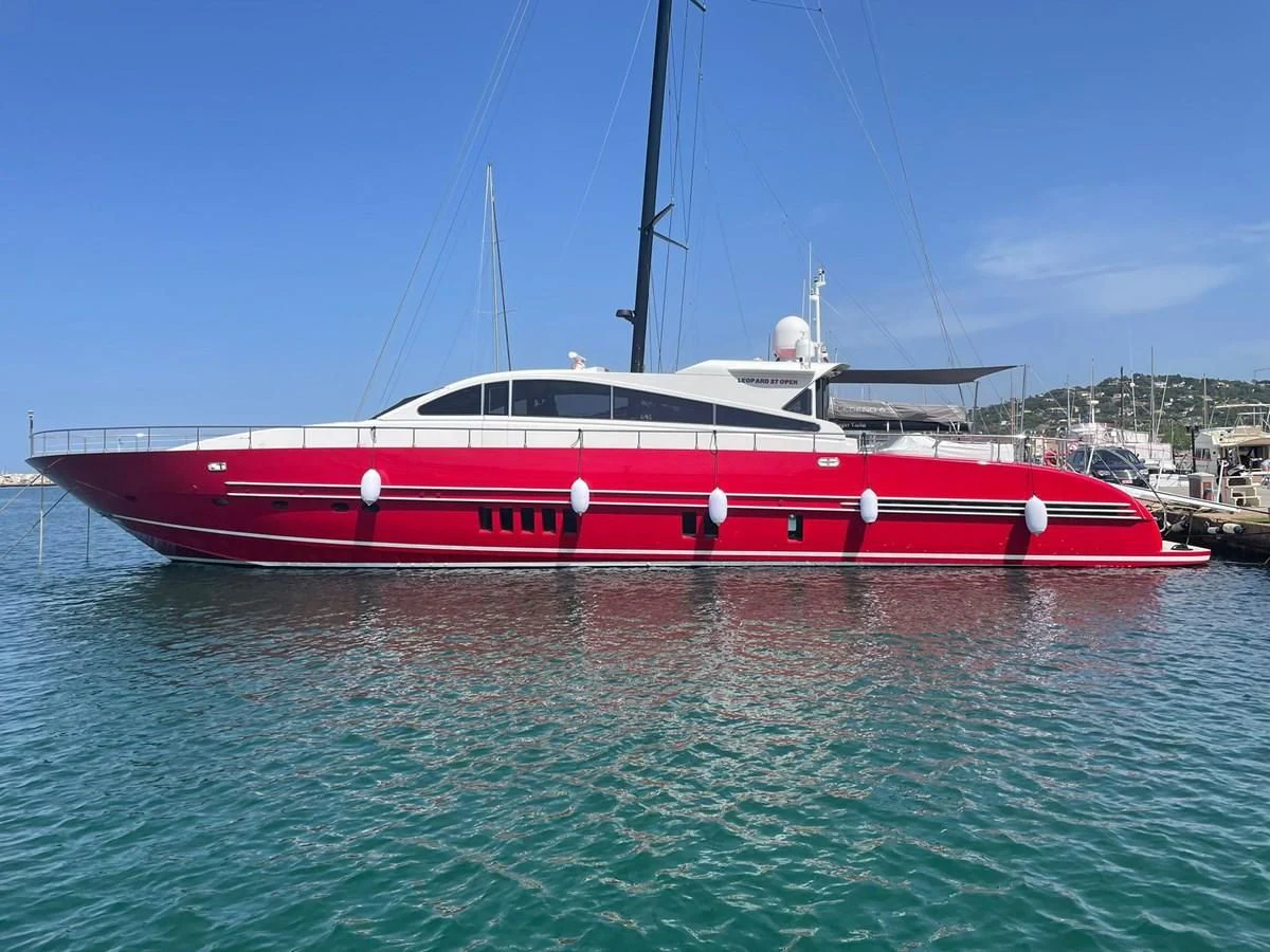 a red and white boat in the water aboard MYSVEN Yacht for Sale