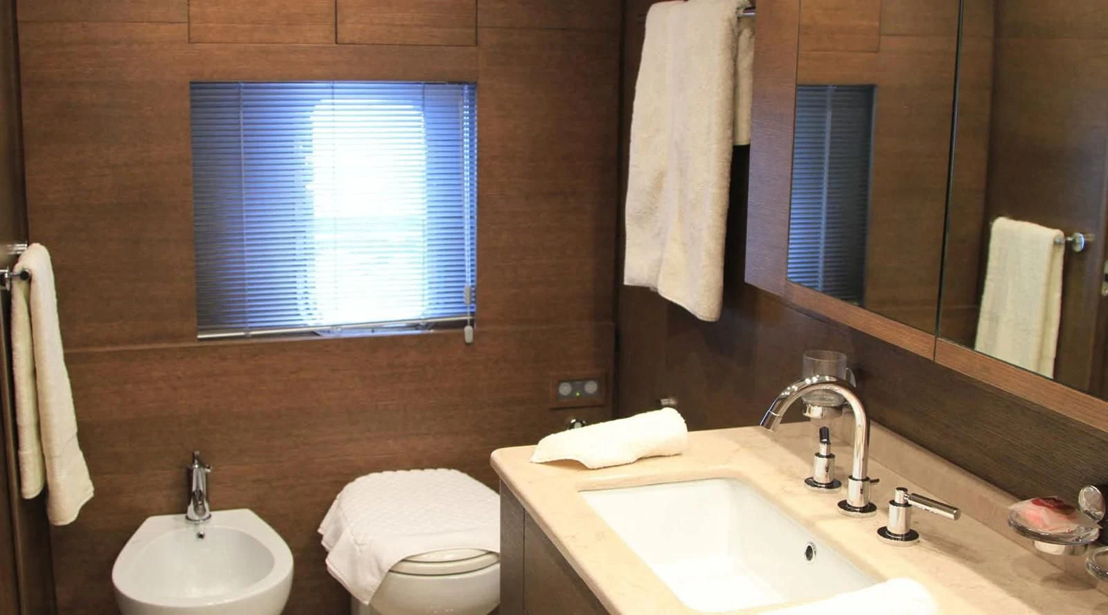 a bathroom with a sink and toilet aboard MYSVEN Yacht for Sale