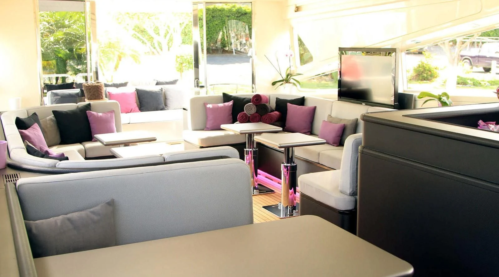 a living room with a couch and a table aboard MYSVEN Yacht for Sale