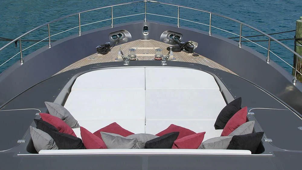 a boat with red and white pillows aboard MYSVEN Yacht for Sale