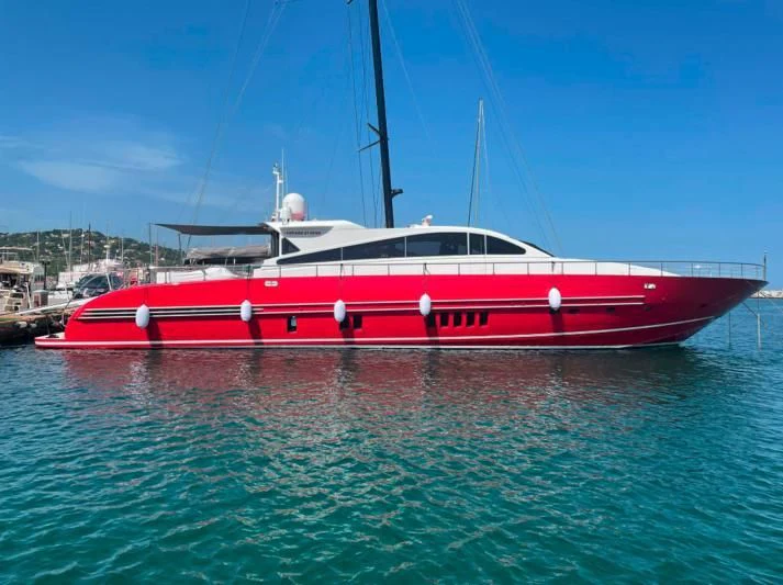 a red and white boat in the water aboard MYSVEN Yacht for Sale