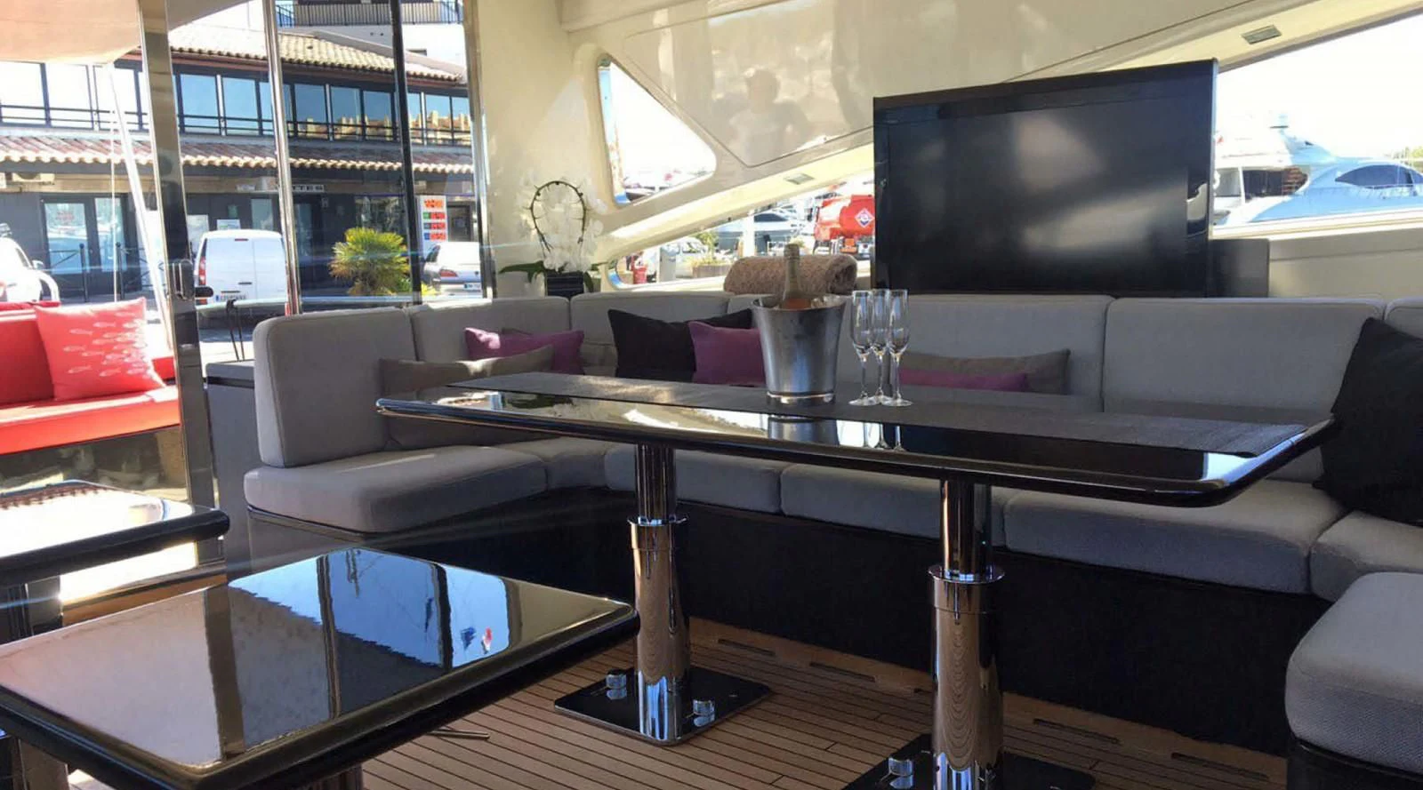 a table with a couch and a tv on it aboard MYSVEN Yacht for Sale