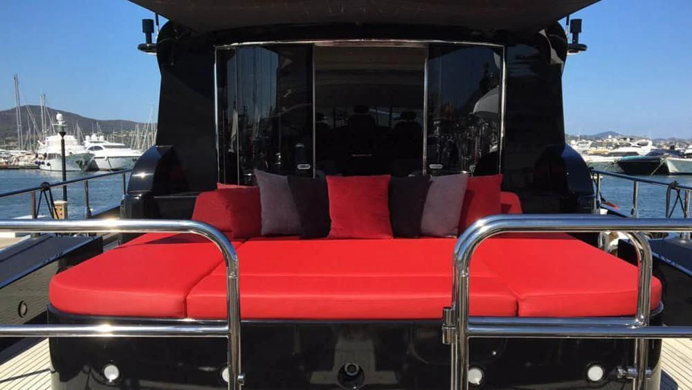 a red and white boat on the water aboard MYSVEN Yacht for Sale