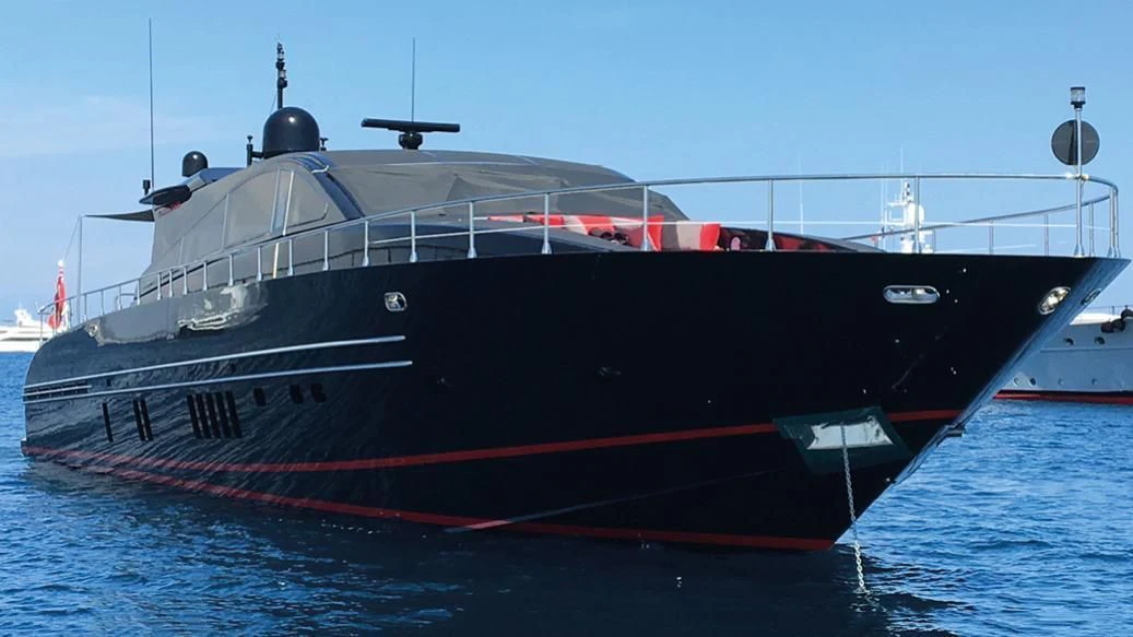 a large black and red boat aboard MYSVEN Yacht for Sale
